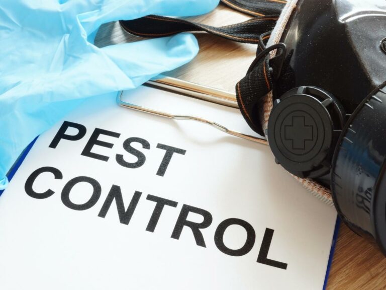 Why do we need pest control? A gas mask and rubber gloves cover a pest control checklist on a clipboard.